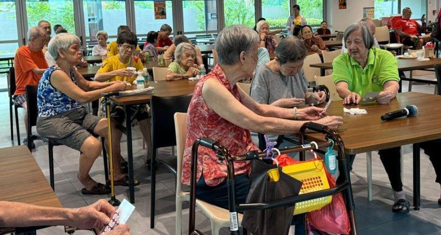 A group of people sitting at tables
AI-generated content may be incorrect.