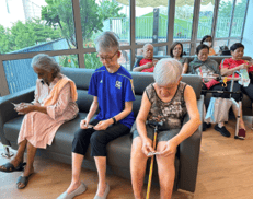 A group of people sitting on a couch
AI-generated content may be incorrect.